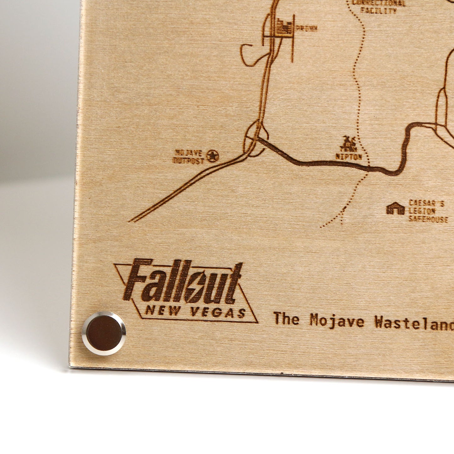 Bottom left corner closeup of laser‑engraved Mojave Wasteland map diagram inspired by Fallout New Vegas.