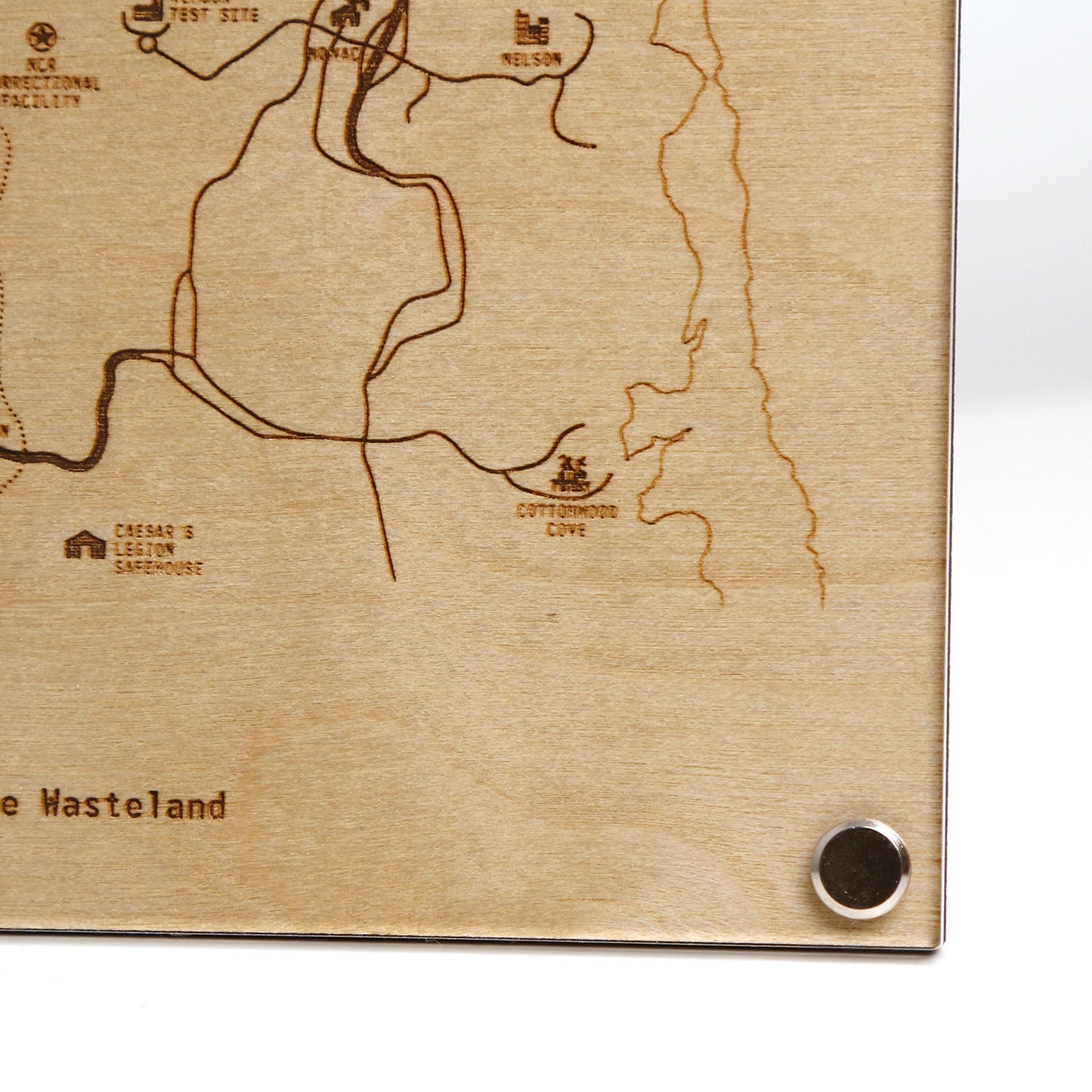 Bottom right corner closeup of laser‑engraved Mojave Wasteland map diagram inspired by Fallout New Vegas.