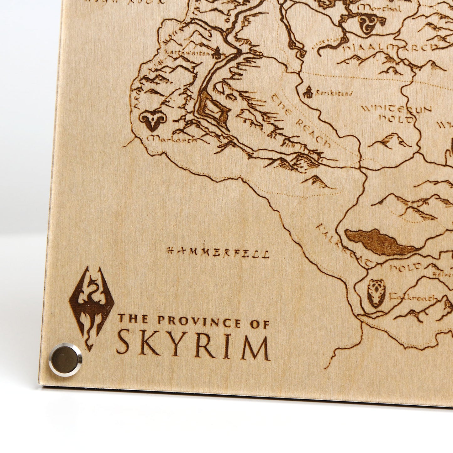 Bottom left corner closeup of laser‑engraved Province of Skyrim map, featuring detailed etched regions, mountains, and holds inspired by The Elder Scrolls V: Skyrim.