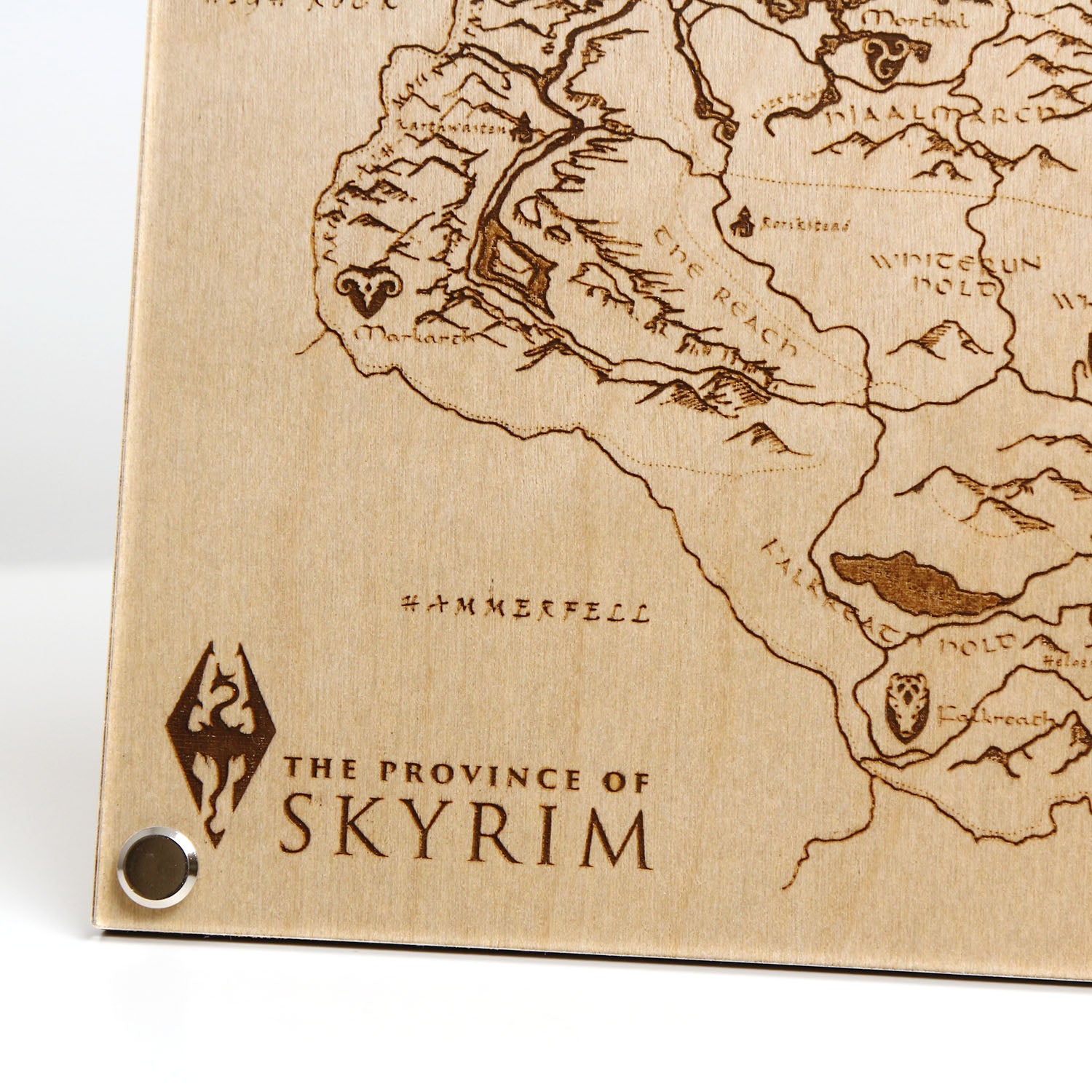 Bottom left corner closeup of laser‑engraved Province of Skyrim map, featuring detailed etched regions, mountains, and holds inspired by The Elder Scrolls V: Skyrim.