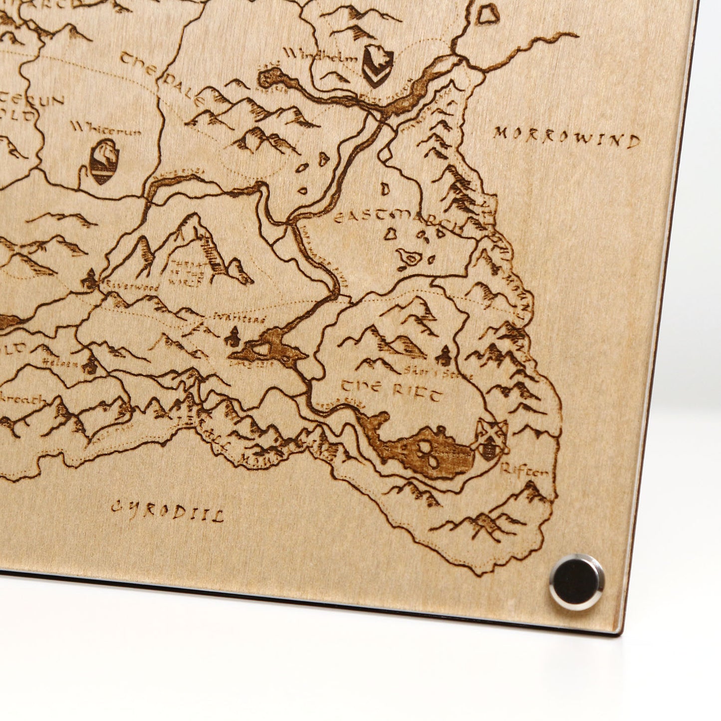 Bottom right corner closeup of laser‑engraved Province of Skyrim map, featuring detailed etched regions, mountains, and holds inspired by The Elder Scrolls V: Skyrim.