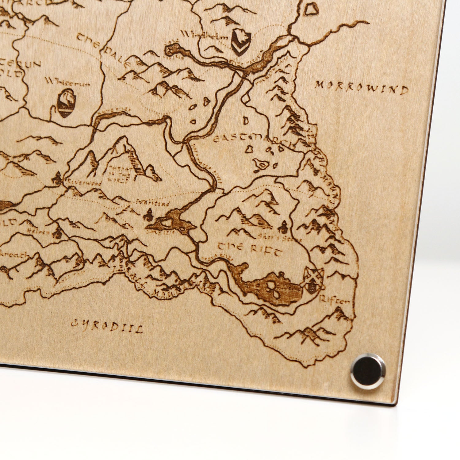 Bottom right corner closeup of laser‑engraved Province of Skyrim map, featuring detailed etched regions, mountains, and holds inspired by The Elder Scrolls V: Skyrim.