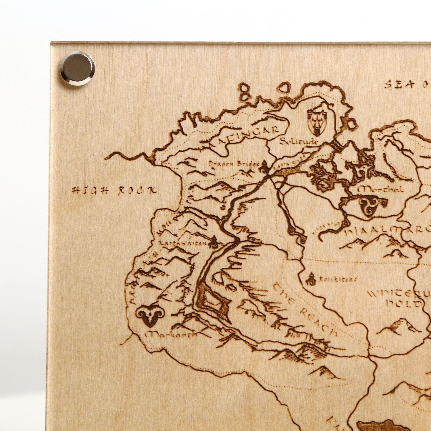 Top left corner closeup of laser‑engraved Province of Skyrim map, featuring detailed etched regions, mountains, and holds inspired by The Elder Scrolls V: Skyrim.