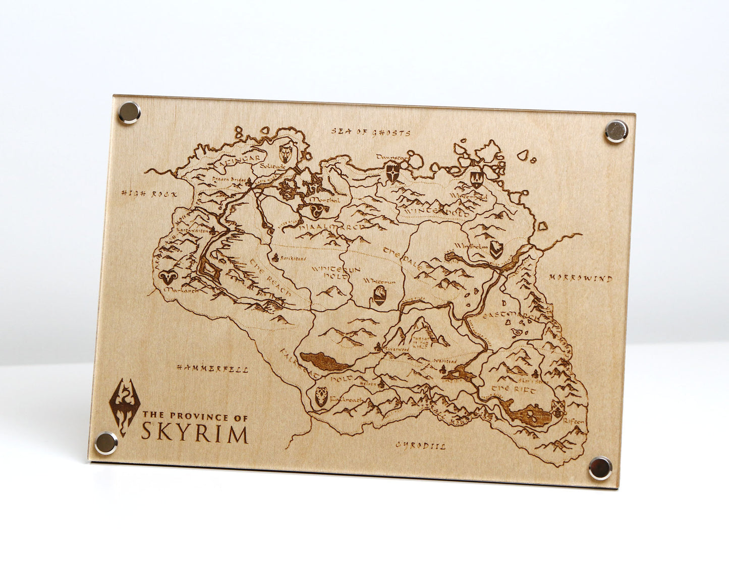 Laser‑engraved Province of Skyrim map on table, featuring detailed etched regions, mountains, and holds inspired by The Elder Scrolls V: Skyrim.