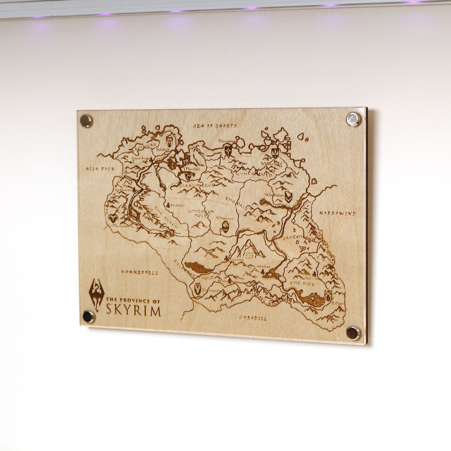Laser‑engraved Province of Skyrim map on wall, featuring detailed etched regions, mountains, and holds inspired by The Elder Scrolls V: Skyrim.