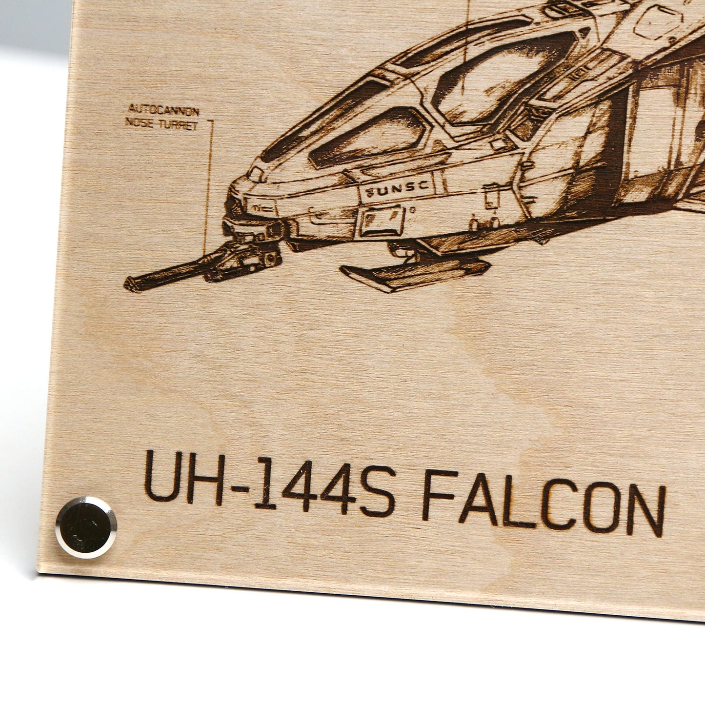 Bottom right corner closeup of laser‑engraved UH‑144S Falcon blueprint on LayaBoard featuring aircraft linework and UNSC‑style technical annotations inspired by Halo.