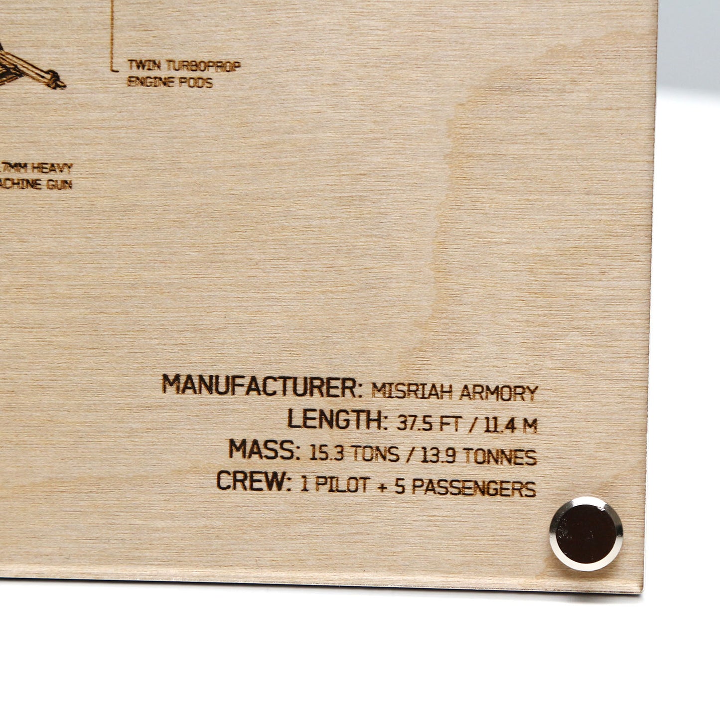 Bottom left corner closeup of laser‑engraved UH‑144S Falcon blueprint on LayaBoard featuring aircraft linework and UNSC‑style technical annotations inspired by Halo.