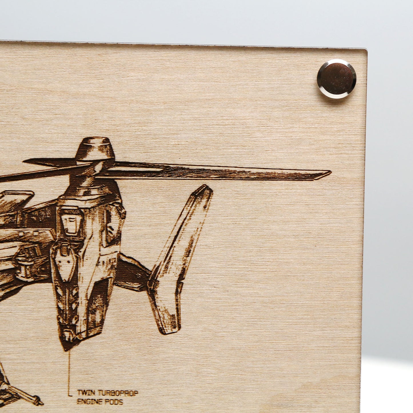 Top right corner closeup of laser‑engraved UH‑144S Falcon blueprint on LayaBoard featuring aircraft linework and UNSC‑style technical annotations inspired by Halo.