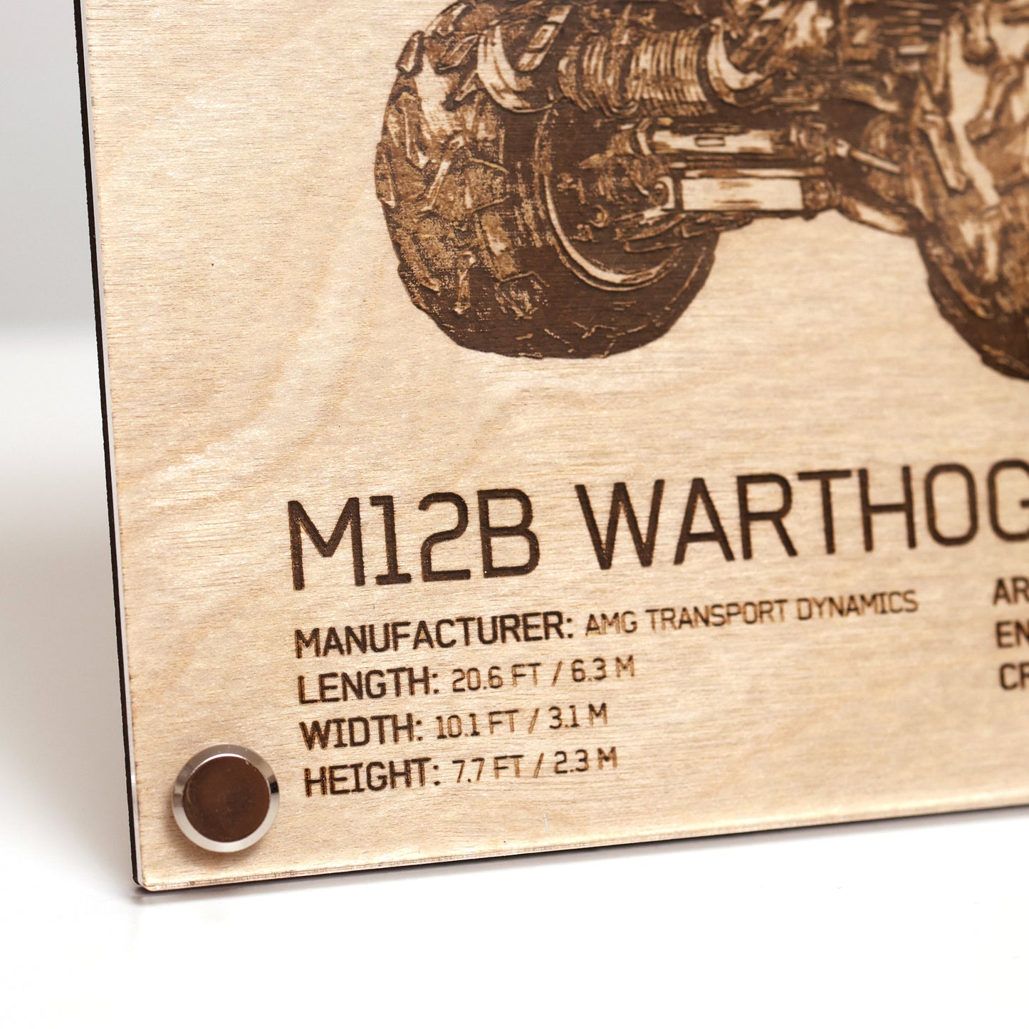 Closeup on lower left corner and text annotations of laser-engraved Halo UNSC M12B Warthog diagram plaque in LayaBoard frame.