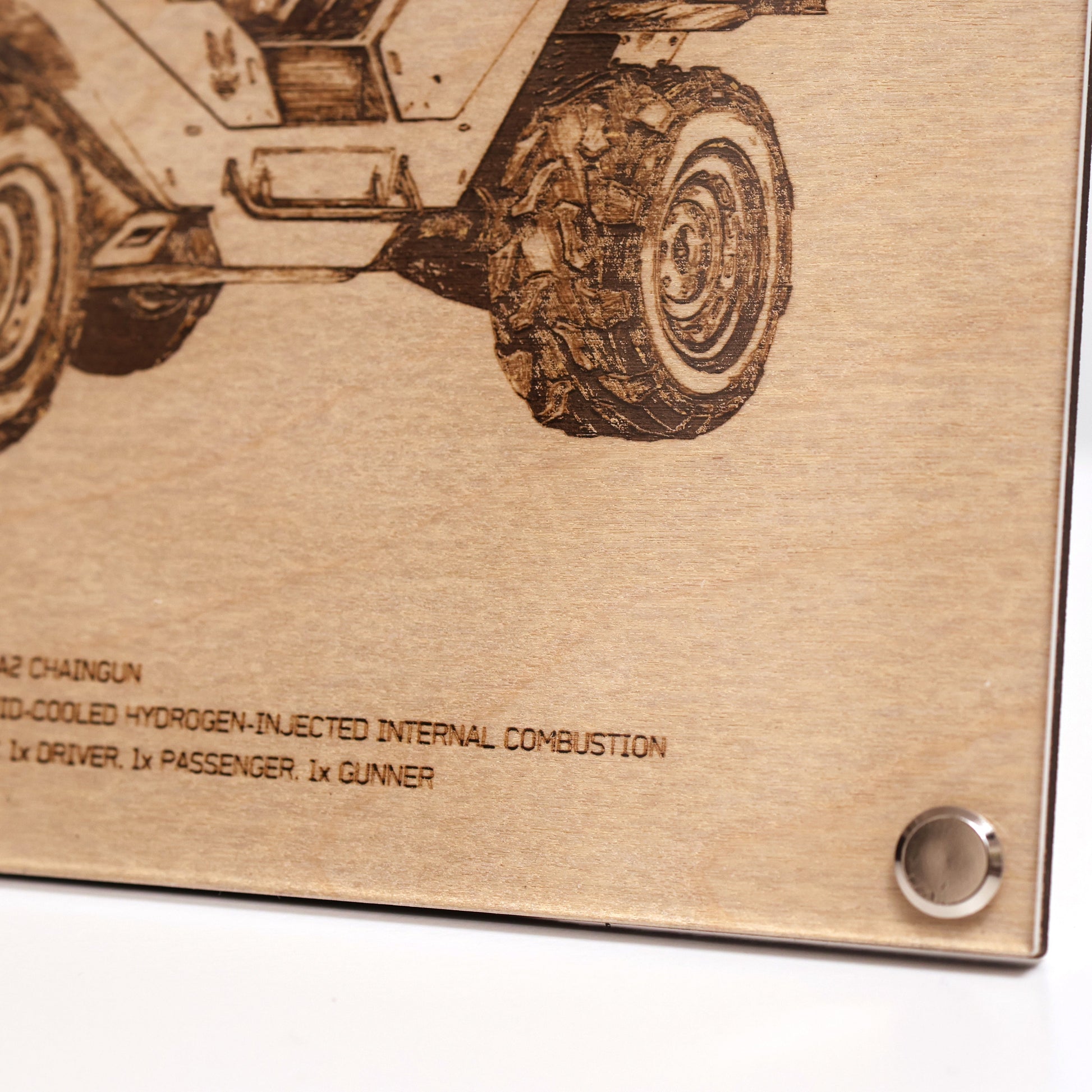 Closeup on lower right corner and text annotations of laser-engraved Halo UNSC M12B Warthog diagram plaque in LayaBoard frame.