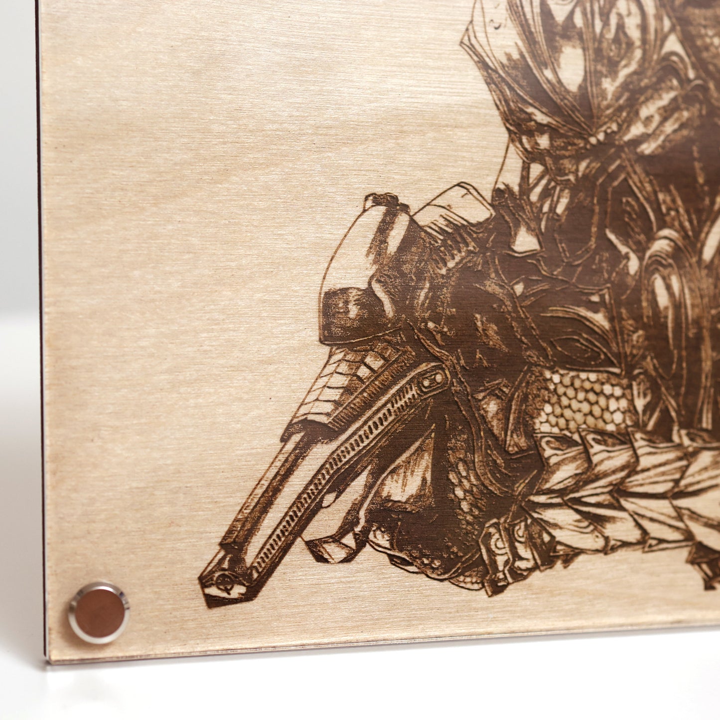 Close‑up on lower left corner of Halo Arbiter portrait engraving with wood frame