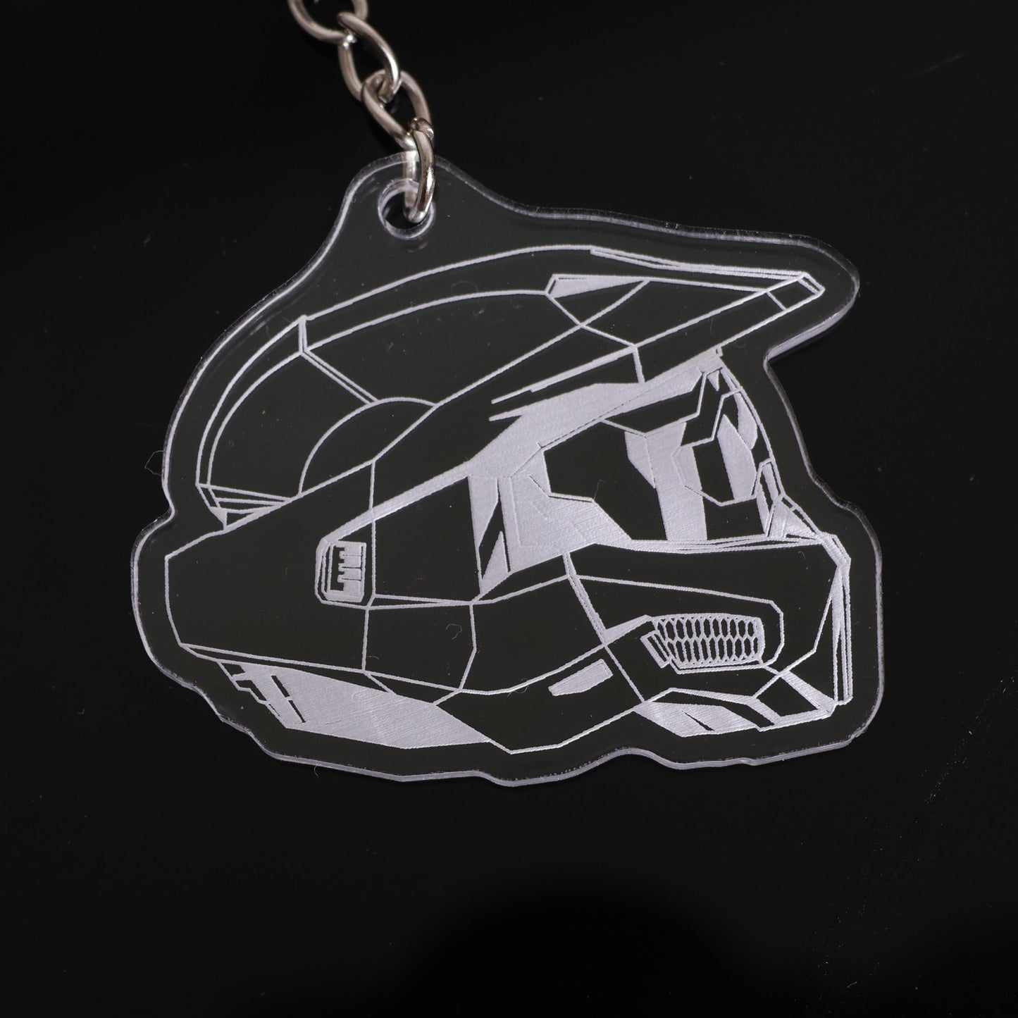 Halo Master Chief Helmet Mark VI keychain made from clear acrylic closeup.