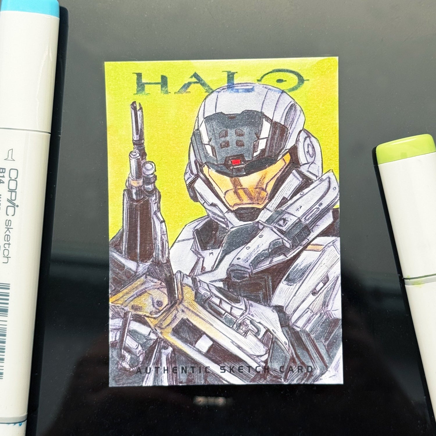 Hand‑drawn Halo Reach Noble Six sketch card with DMR, illustrated by Entransing on premium Community Card stock.