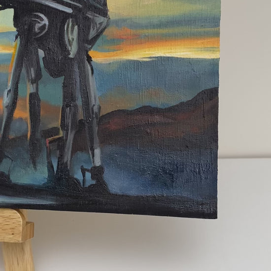 Video showing details of original oil painting on wood panel depicting silhouetted AT-AT walkers from Star Wars marching across a misty landscape at sunset. Vivid orange, yellow, and blue tones create a dramatic sci-fi atmosphere, with bold contrast and cinematic composition.