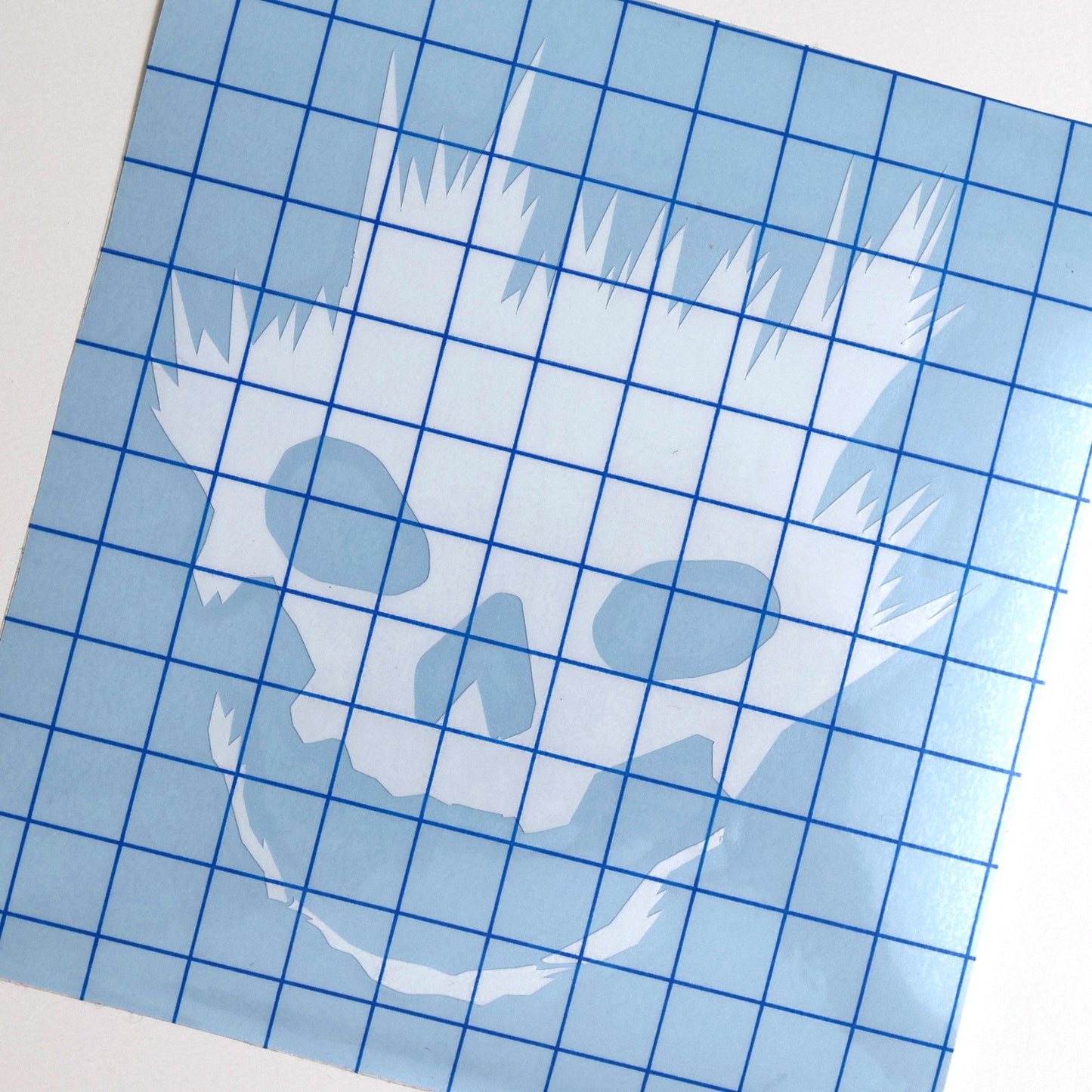 Entransing's stylized Halo Emile skull helmet decal in white vinyl with transfer tape, ideal for cars, laptops, and fan collections.