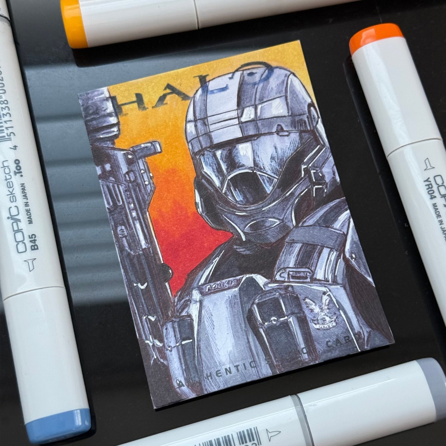 Detailed illustration of The Rookie from Halo 3: ODST on original art trading card.